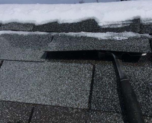 Winter Ice Damage ice lifting shingles then melting