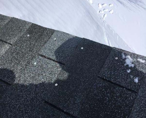 Winter Ice Damage repaired shingles