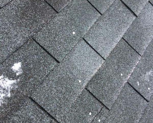 Winter Ice Damage repaired shingles